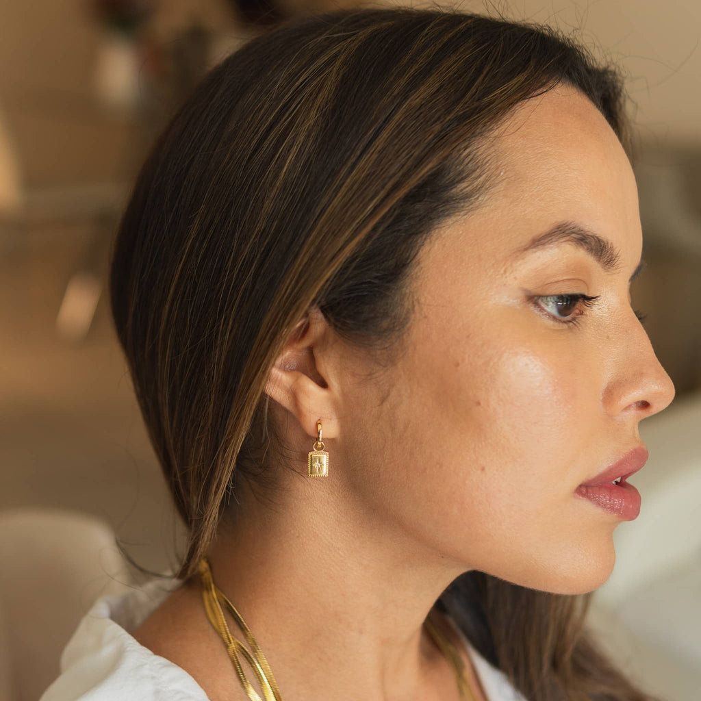 High-Quality Gold Drop Earrings Featuring a Unique Starburst Design